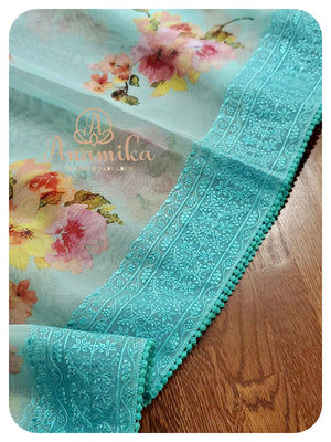 Pastel Blue Organza saree with pink handworked blouse
