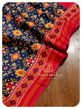 Blue satin patola saree with red handworked blouse