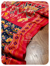 Blue satin patola saree with red handworked blouse