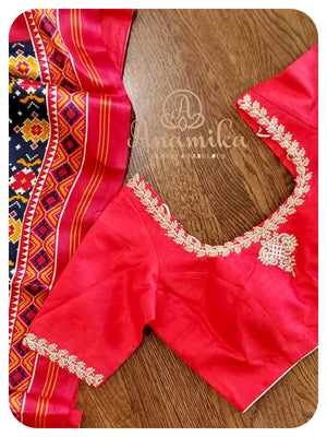 Blue satin patola saree with red handworked blouse