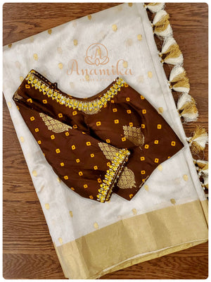 Cream Chanderi Pattu saree with brown bandini blouse
