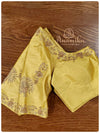Maroon Banarasi silk saree with a gold work blouse