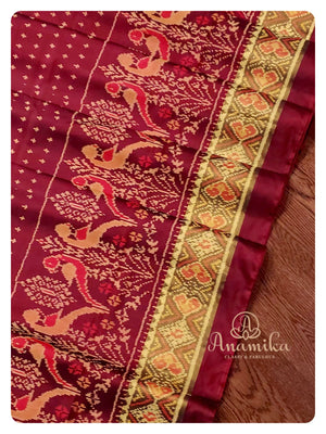 Brown Patola saree with classic full sleeves blouse