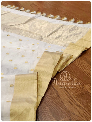 Cream Chanderi Pattu saree with brown bandini blouse