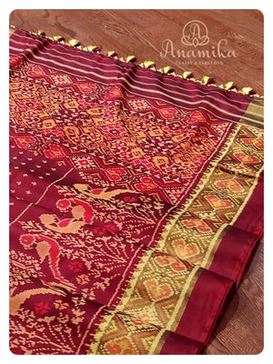 Brown Patola saree with classic full sleeves blouse