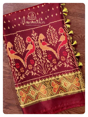 Brown Patola saree with classic full sleeves blouse