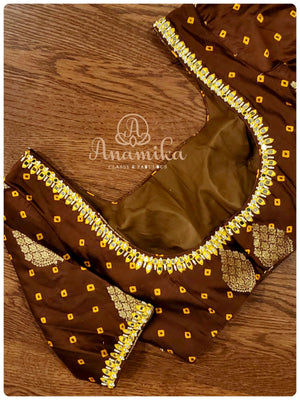 Cream Chanderi Pattu saree with brown bandini blouse