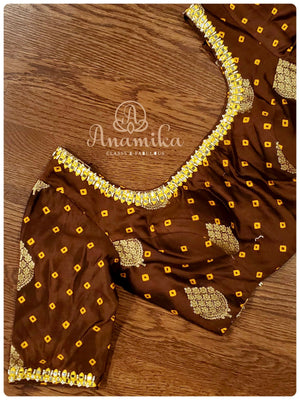 Cream Chanderi Pattu saree with brown bandini blouse