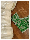 Cream Organza saree with Green heavy work blouse