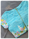 Off white Organza saree with a blue designer work blouse