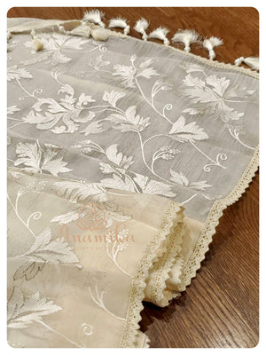 Cream Organza saree with Green heavy work blouse