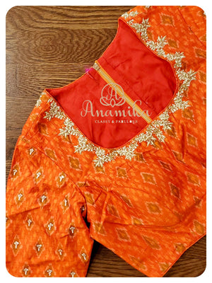 Cream Kora saree with orange ikkat blouse