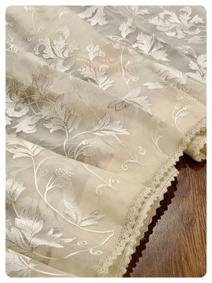 Cream Organza saree with Green heavy work blouse