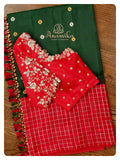 Dark green Gadwal silk saree with red handwork blouse