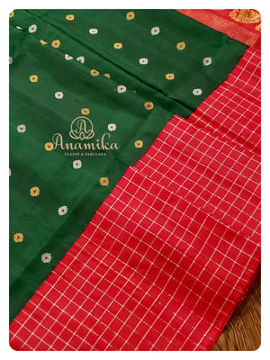 Dark green Gadwal silk saree with red handwork blouse