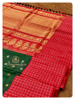 Dark green Gadwal silk saree with red handwork blouse