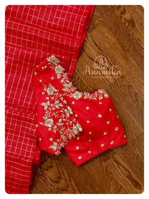 Dark green Gadwal silk saree with red handwork blouse