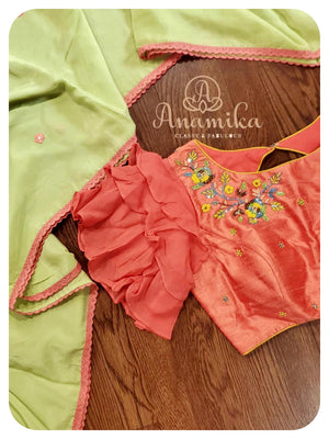 Lime Green crepe saree with peach ruffle blouse