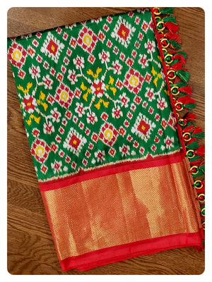 Green Patola Ikkat Saree with Red Blouse