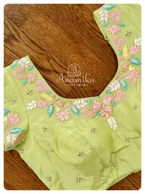 Pastel Green Organza Saree with Threadwork blouse