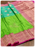 Shaded Green Banarasi Silk saree with Pink Bandini Blouse