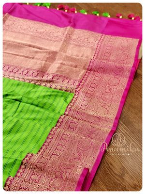 Shaded Green Banarasi Silk saree with Pink Bandini Blouse