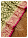 Olive Green Banarasi georgette saree with majenta pink border