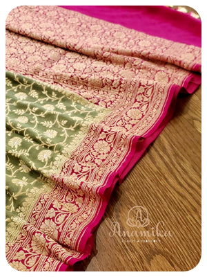 Olive Green Banarasi georgette saree with majenta pink border
