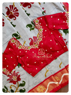 Grey Floral Ikkat Patol with a contrast Red work blouse