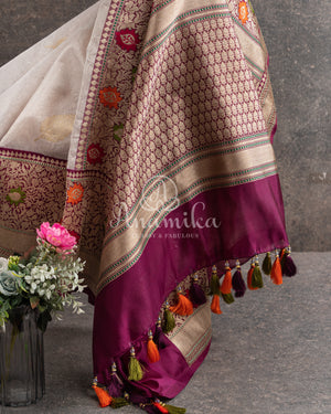 Off white Banarasi kora tissue saree with meenakari border