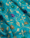 Hues of blue banarasi georgette saree with meenakari border