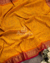 Mustard yellow Bandini Silk saree with Paithani pallu