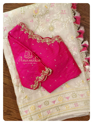 Off white kota Chikankari saree with hot pink blouse