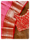 Pink/Red Venkatagiri Pattu saree with a heavy work blouse