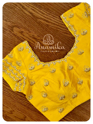 Pink Bandini Gharchola with a yellow blouse