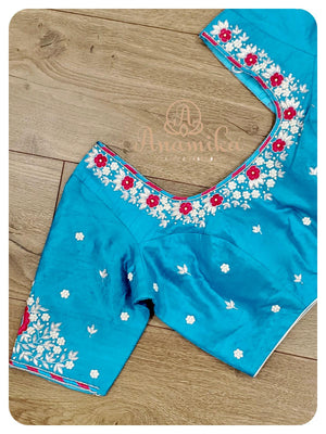 Pinkish Red Pattu saree with Blue Blouse