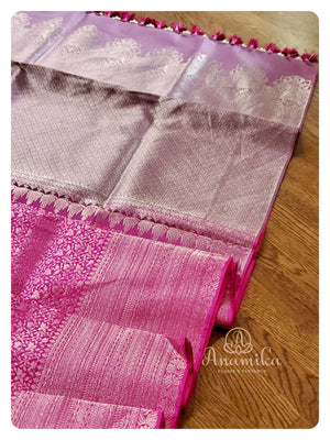 Hot Pink Kanchipattu saree with off white blouse