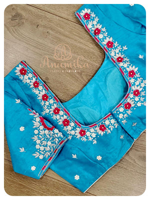 Pinkish Red Pattu saree with Blue Blouse