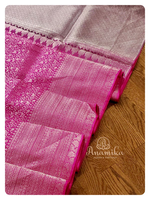 Hot Pink Kanchipattu saree with off white blouse