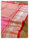 Pink/Red Venkatagiri Pattu saree with a heavy work blouse