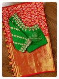Red Kanchipattu big border saree with Green Blouse