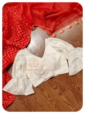 Red Dhakai saree with white ruffle blouse
