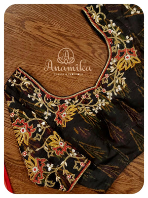 Red Muslin Dhakai Saree with black ikkat blouse