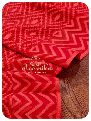 Red Dhakai saree with white ruffle blouse