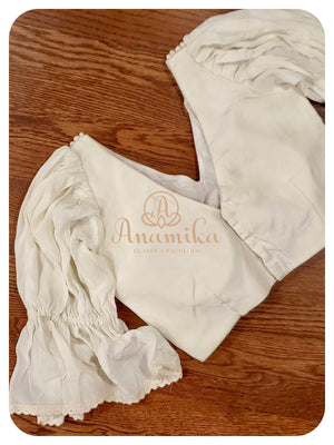 Red Dhakai saree with white ruffle blouse