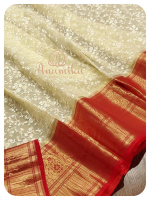 Cream chikankari organza with red kanchi border