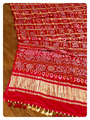 Red bandini gharchola with off white chikankari work blouse