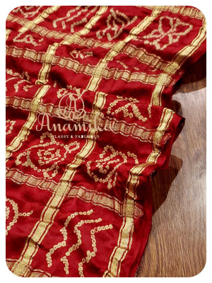 Maroonish Red Gharchola saree with Ajrak Pallu