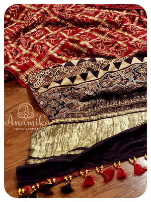 Maroonish Red Gharchola saree with Ajrak Pallu