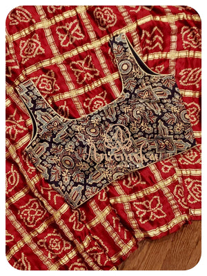 Maroonish Red Gharchola saree with Ajrak Pallu